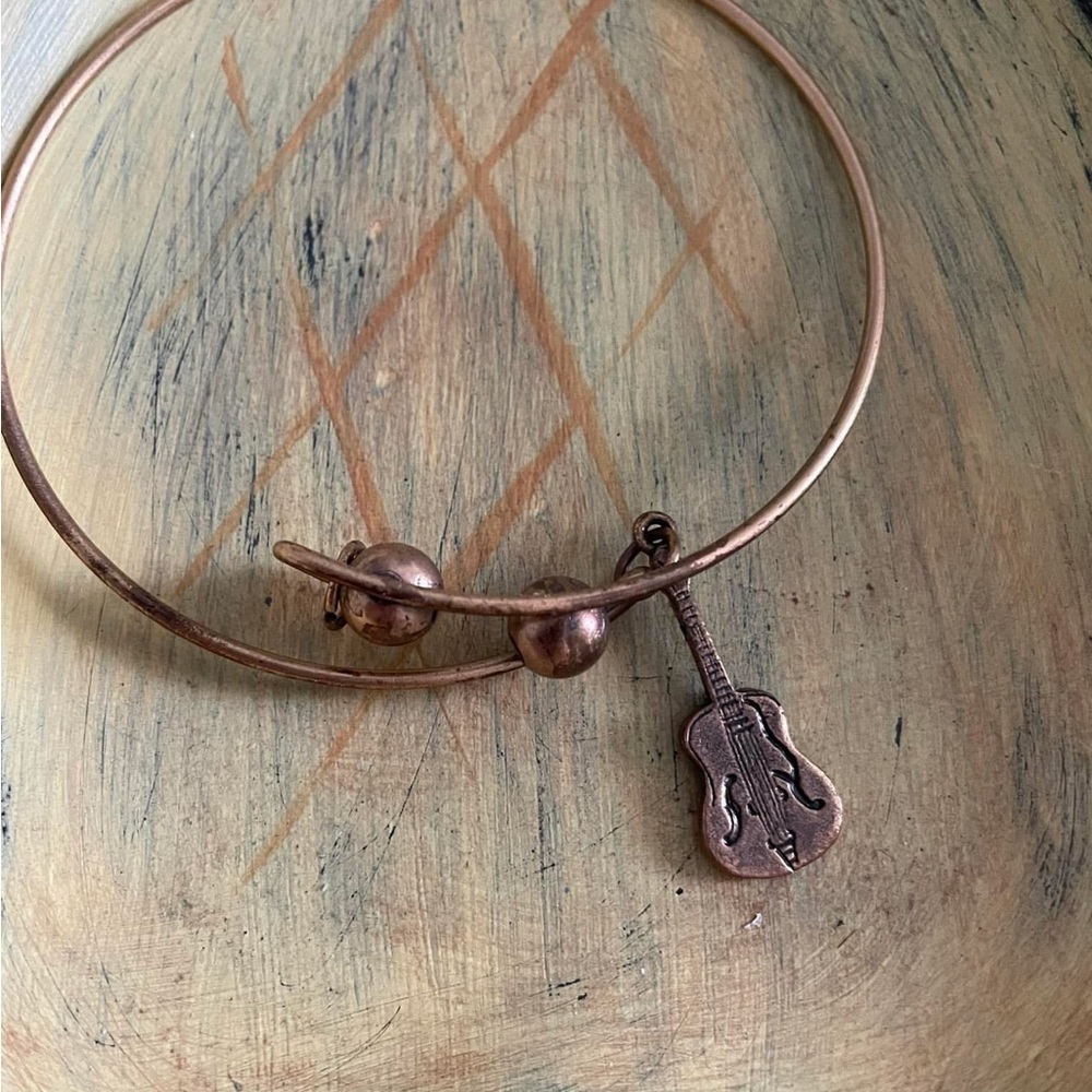 Bronze bangle bracelet with guitar charm